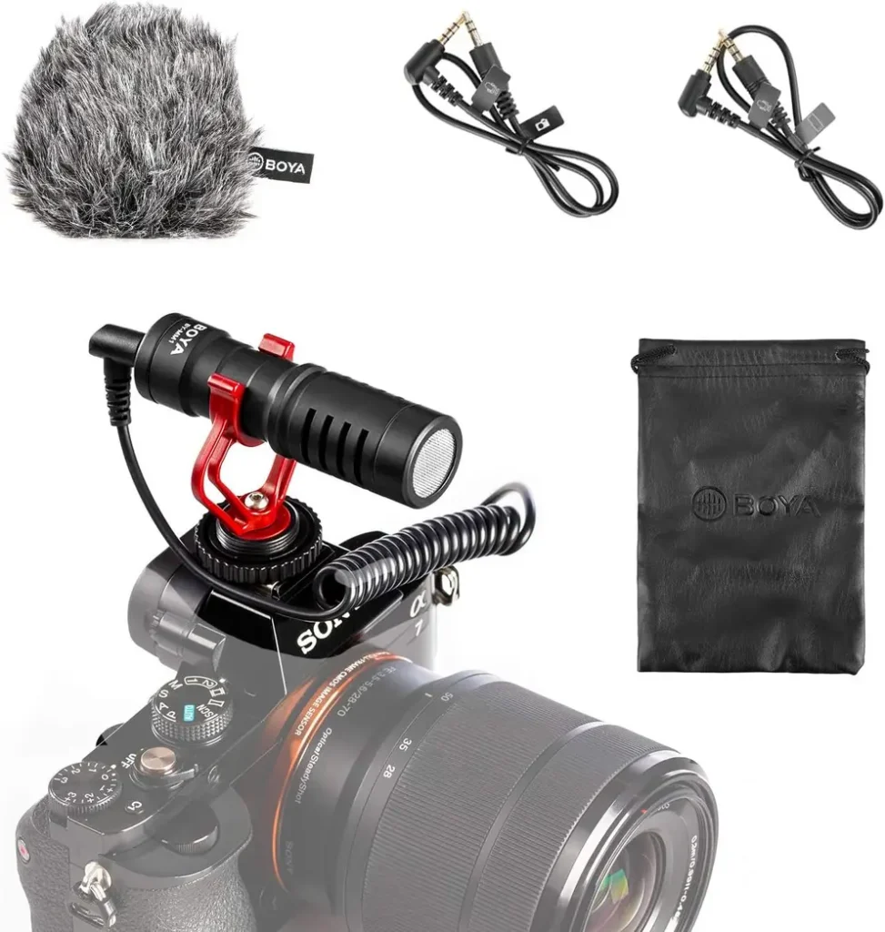 Microfone Boya BY-MM1 Shotgun preto com para-brisa deadcat cinza e suporte de choque.
